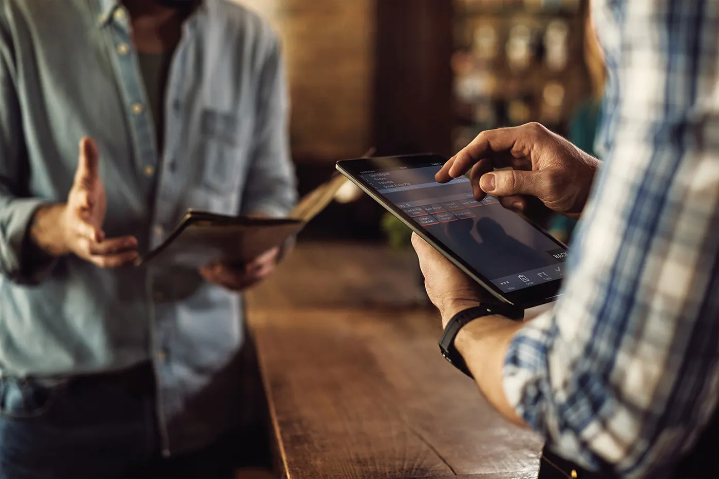 Waiter taking an order on ICRTouch PocketTouch (image: ICRTouch)