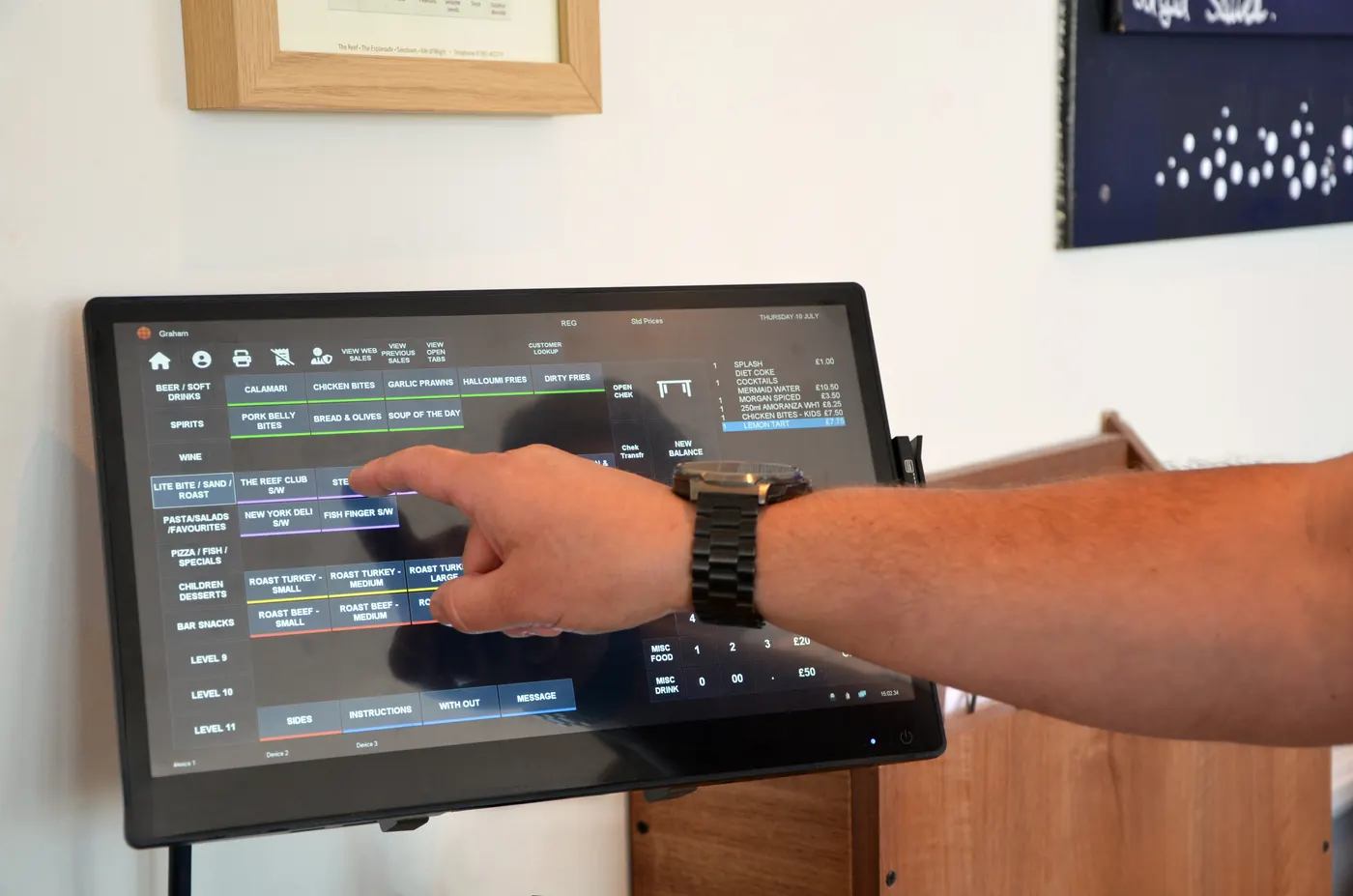 A till at a waiter station in a busy restaurant (image: ICRTouch)